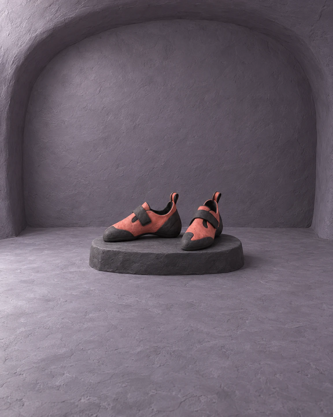 A pair of coral-colored clay climbing shoes with dark soles and fastening straps sits on a low charcoal display platform inside a spacious violet-gray alcove.