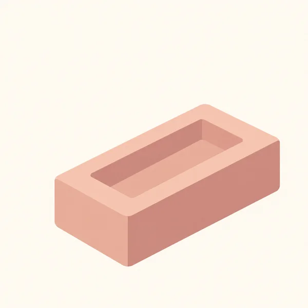 A single peach and dusty-rose rectangular brick is shown diagonally against an ivory background, with a long shallow recess in its top and two visible side…