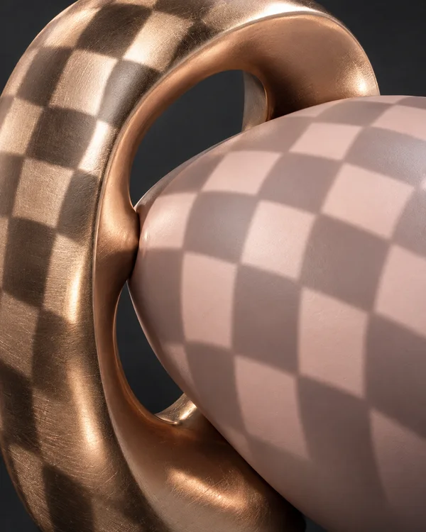 An extreme close-up of a blush-colored rounded form bulging through a tilted rose-gold loop, with checkerboard light and shadow across both surfaces against a…
