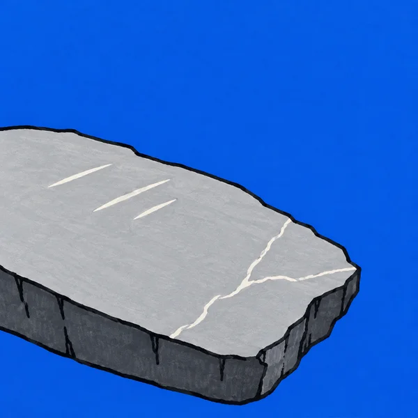 A broad, pale grey stone slab with a dark charcoal side and three light cuts plus a branching vein extends off the left and bottom edges against a solid…