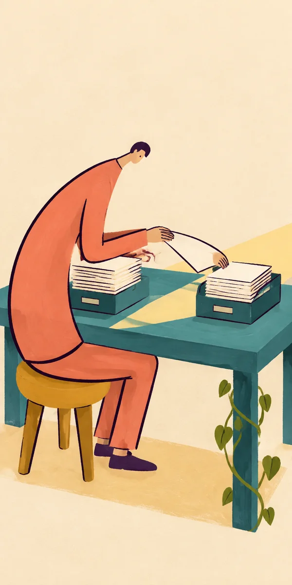 A stylized office worker in coral clothing sits on an ochre stool, moving a blank sheet between two stacks of paper on a broad teal desk.