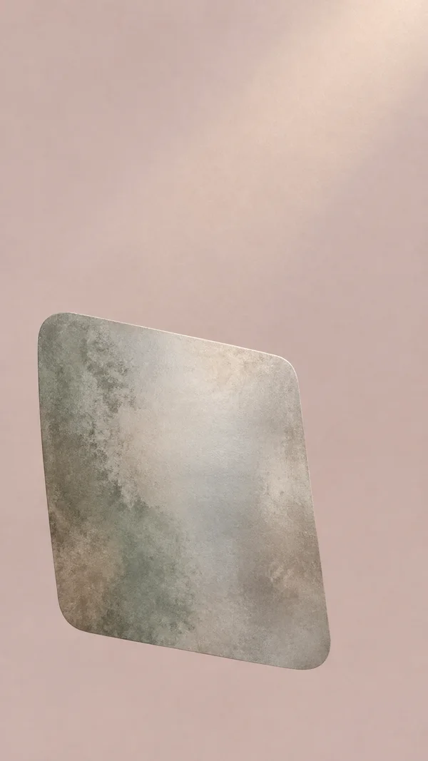 A large, rounded rectangular silver-grey form tilts across the lower half of a warm pale mauve background.