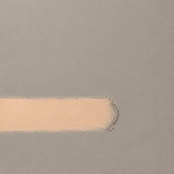 Minimal square abstract artwork with a pale apricot horizontal band wiped across the lower third of a textured putty-grey field, ending in a rough bowed ridge…