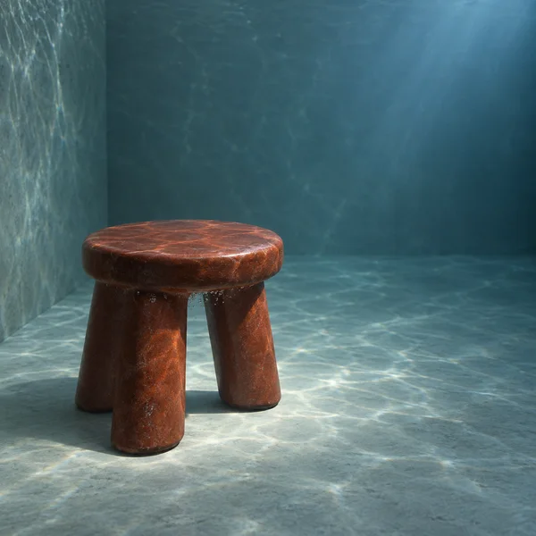 A squat rust-red ceramic stool with a round seat and three thick legs stands on the floor of a blue-grey underwater alcove, lit from the upper right with light…