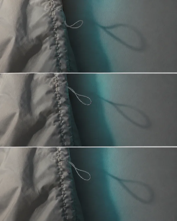 Three horizontal close-up photographs show a pale grey jacket’s stitched edge beside a textured grey wall.