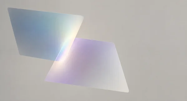 Two translucent, softly rounded quadrilateral fields—smoky blue above and pale lavender below—overlap diagonally on a warm-grey background, with a bright…