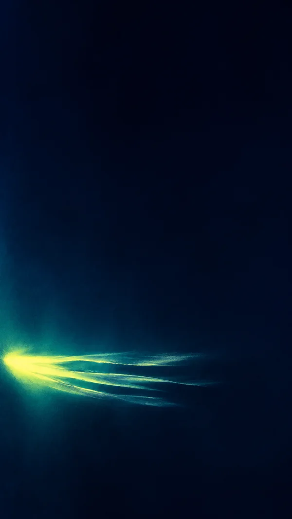 A vivid electric-citron light streak with several tapered, separated trails crosses the lower part of a deep midnight-blue vertical abstract image, surrounded…