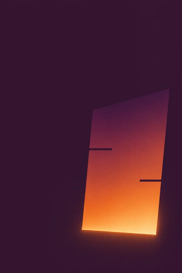 A tall, slightly skewed quadrilateral glows orange along its lower edge against a deep aubergine field, with two staggered dark notches cutting in from…