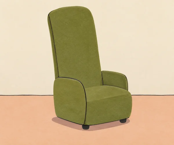 A moss-green lounge chair with an unusually tall rounded back, broad seat, stubby arms, and two small dark feet stands against a warm-cream wall and pale peach…