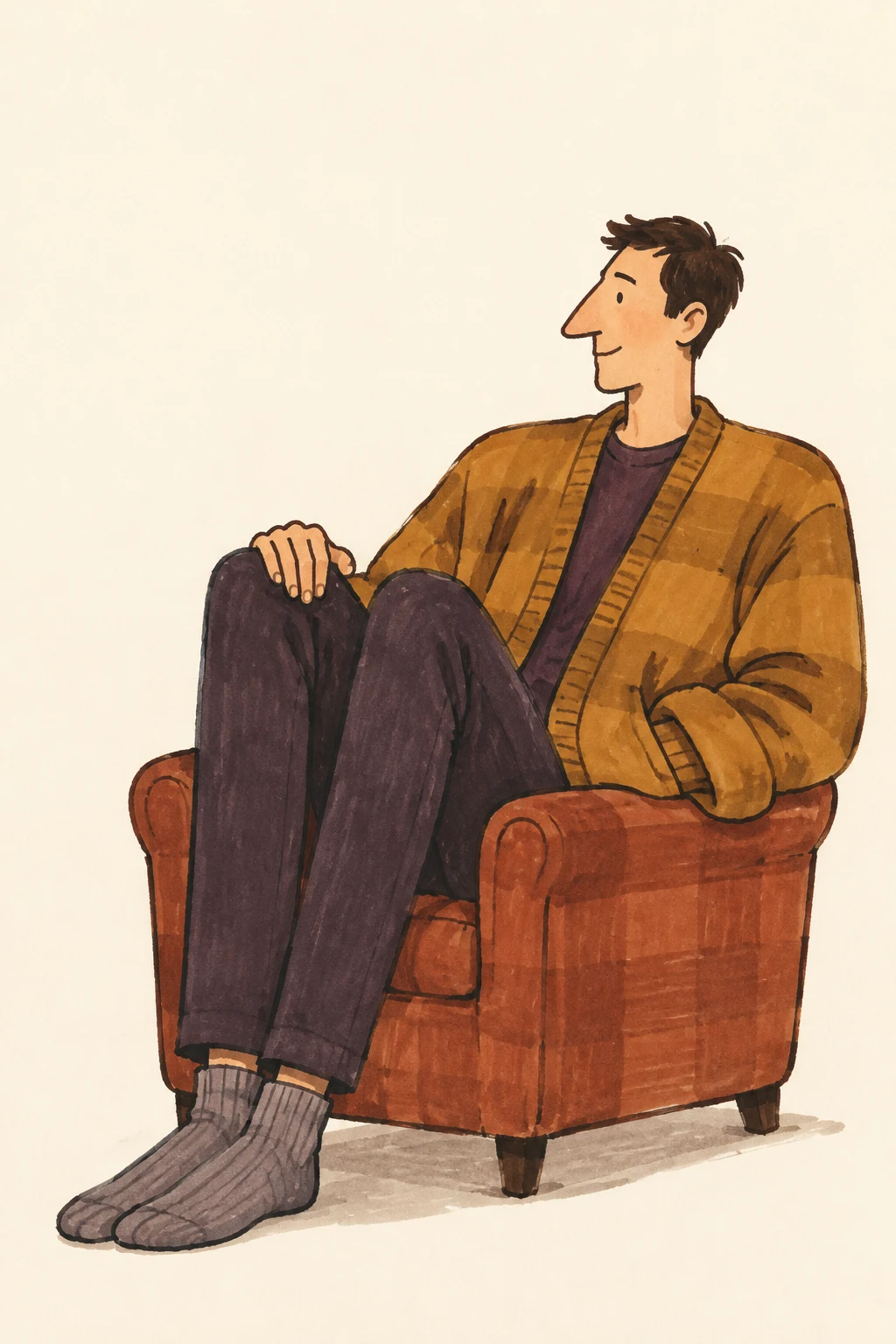 A short-haired adult sits sideways in a rust-colored armchair, wearing an oversized ochre cardigan, plum trousers and gray socks, with knees raised and feet…