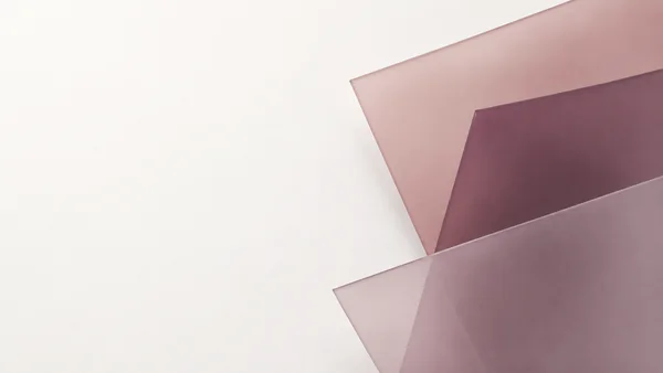 Three overlapping translucent angular planes in dusty rose, smoky plum and pale mauve extend from the right edge over a warm chalk-white background, leaving…