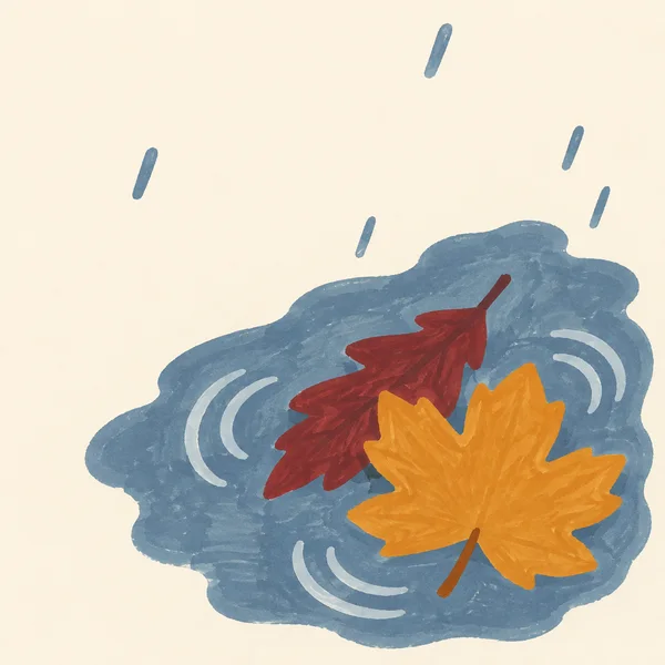 Two overlapping ochre and burgundy maple leaves sit in a large blue-grey puddle on warm cream ground, with slate-blue rain dashes and pale curved ripple marks…