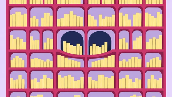 A close, straight-on view of a raspberry-colored bookshelf filled with upright butter-yellow books in rounded cubbies against lavender.