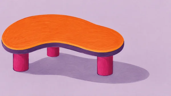 An orange kidney-shaped table with a violet underside and three chunky fuchsia legs sits on a pale lilac ground, casting a long muted-violet shadow to the…
