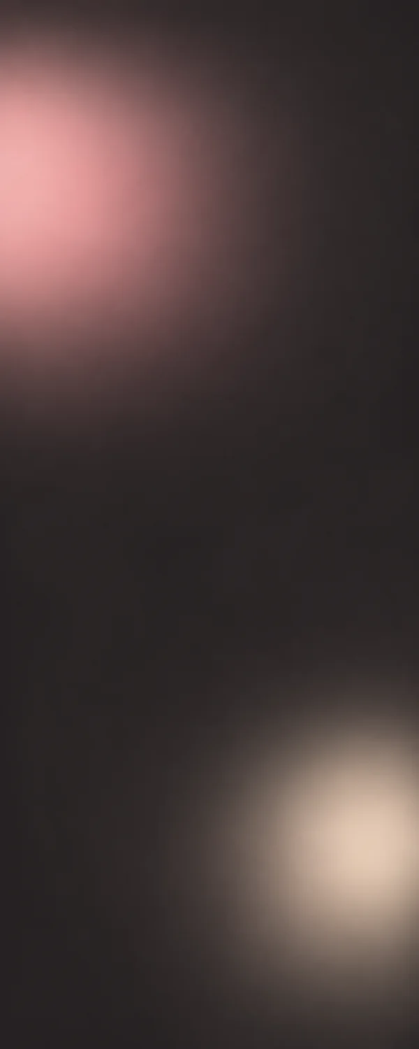 A portrait abstract composition with a diffuse dusty-rose glow entering from the upper left and a warm ivory glow near the lower right, separated by a large…