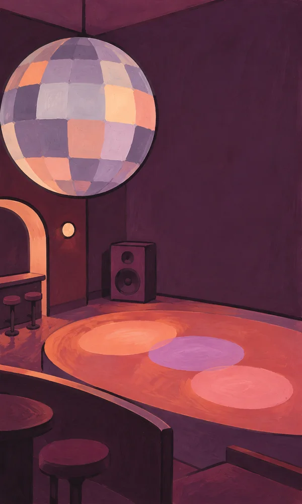An empty aubergine-colored dance club with a large patchwork disco ball hanging above a coral oval dance floor.