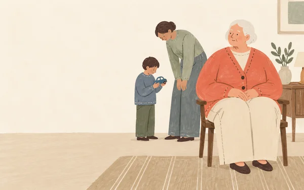 A white-haired elder in a coral cardigan and cream trousers sits in a wooden chair on the right, while a taller adult in sage bends toward a child holding a…