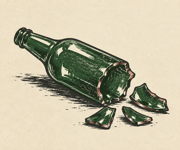 A dark green glass bottle lies diagonally on cream paper, its neck pointing upper left and its jagged broken base beside three matching shards.