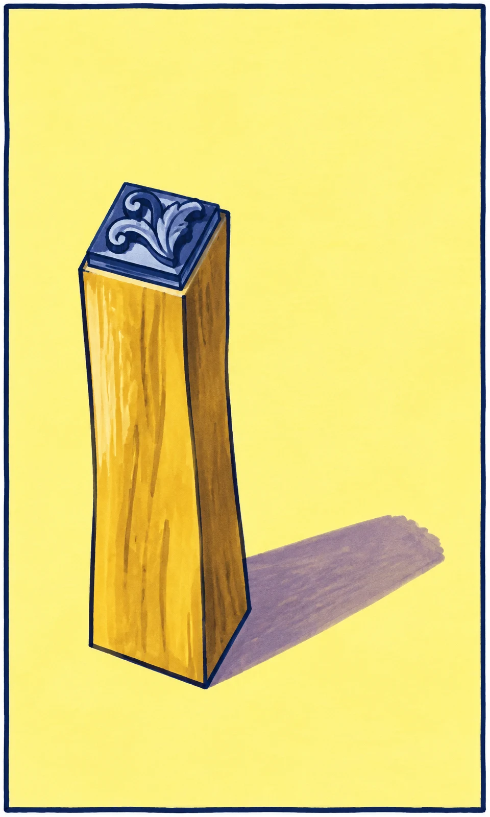 A tall, tapered yellow wooden block stands on a pale-yellow surface, topped with an indigo plate bearing a raised curling leaf-like design.