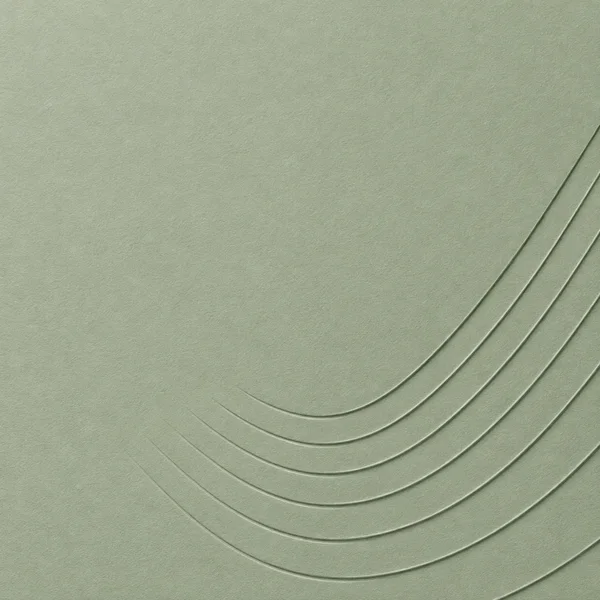 A pale sage-green textured surface with seven shallow, nested U-shaped grooves sweeping across the lower-right and continuing off the right and bottom edges.