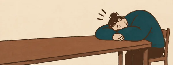 A dark-haired adult in a deep-teal top sits at the right end of a long brown table, resting their head on folded arms.
