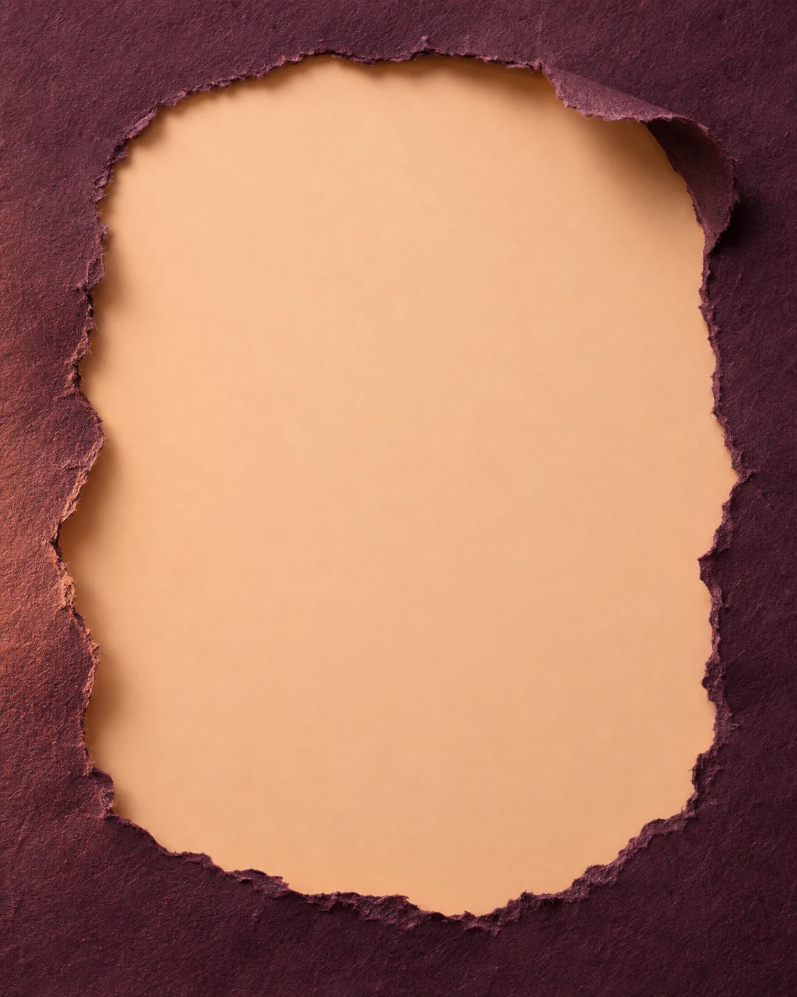 A deep plum textured paper sheet frames a large blank peach opening, with rough torn edges and dark shadows along the rim.
