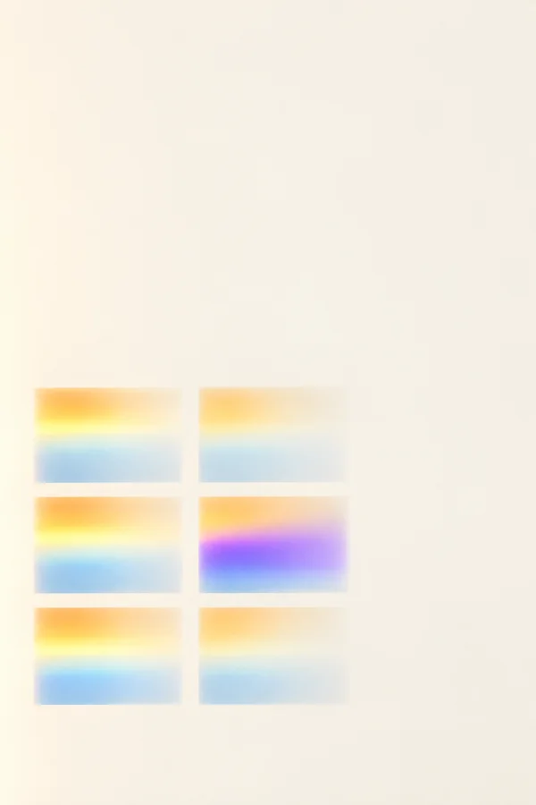 Six softly glowing rectangular patches form a two-column, three-row grid on a warm ivory background.