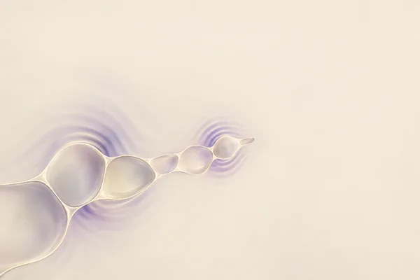 A translucent cream cellular ribbon enters from the lower-left and narrows toward the centre, with soft lilac bands around its curved boundaries against a warm…