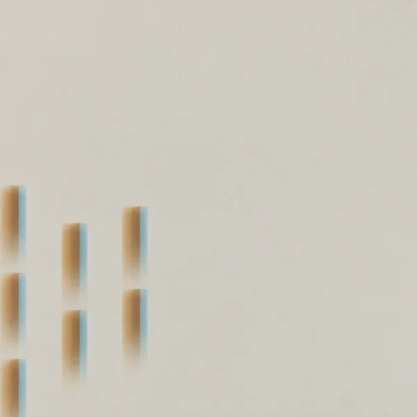 A sparse abstract pattern of soft amber vertical bars edged with pale cyan sits along the left side of a warm light-grey field, with broad empty space above…