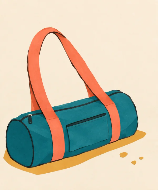 A teal sports duffel with rounded ends, a side pocket and a large coral handle loop rests on a warm cream background above an ochre shadow, with three golden…