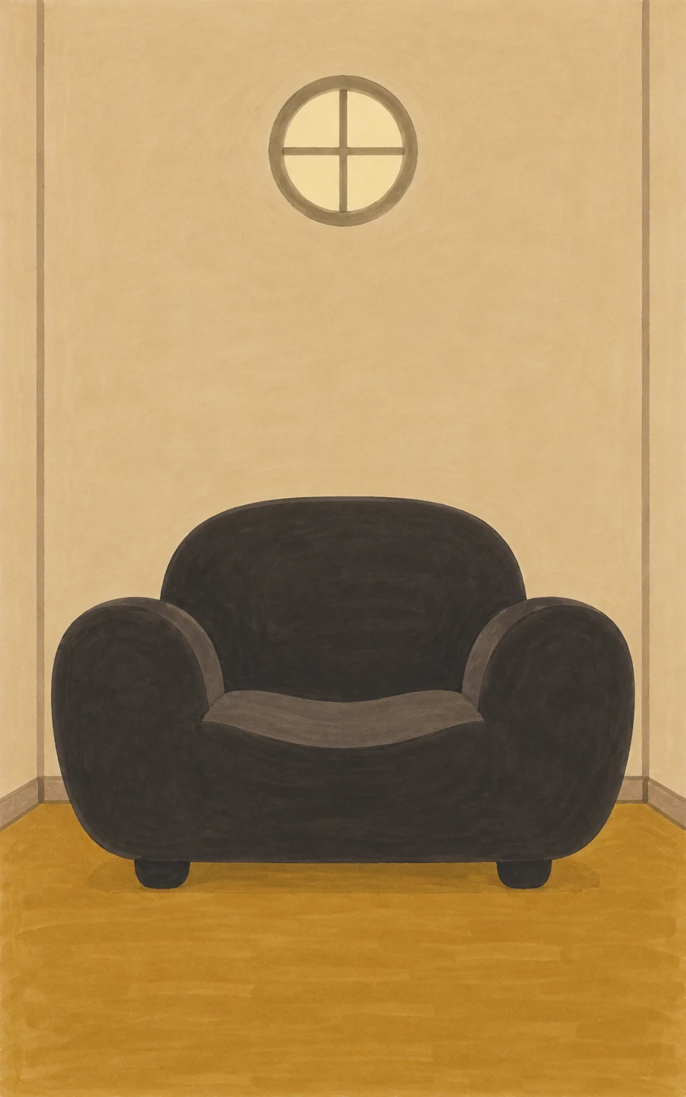 A very wide charcoal armchair with rounded arms and short feet sits centered in a warm ochre-floored room beneath a small circular window.