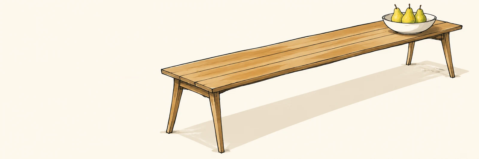 A long, narrow honey-brown wooden table runs diagonally across a warm ivory background, with a white bowl holding three yellow-green pears at its far end and a…