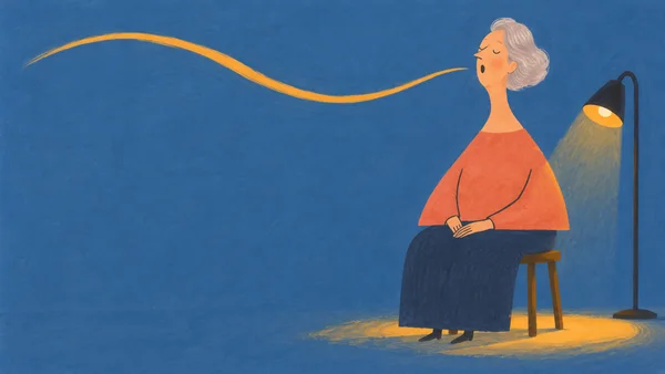 A silver-haired woman sits on a low wooden stool in a long dark skirt, eyes closed and mouth open as an amber line sweeps across the blue background; a floor…