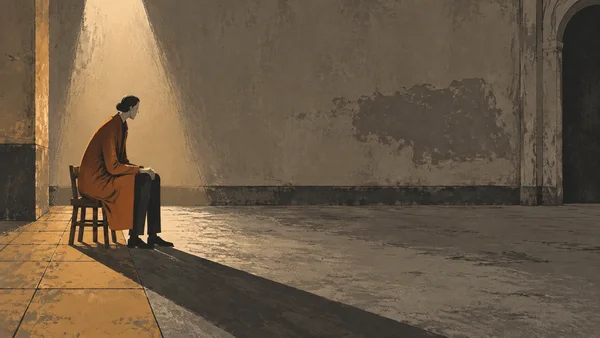 A long-legged figure in a rust coat sits hunched on a small wooden chair at the left of a large empty hall.