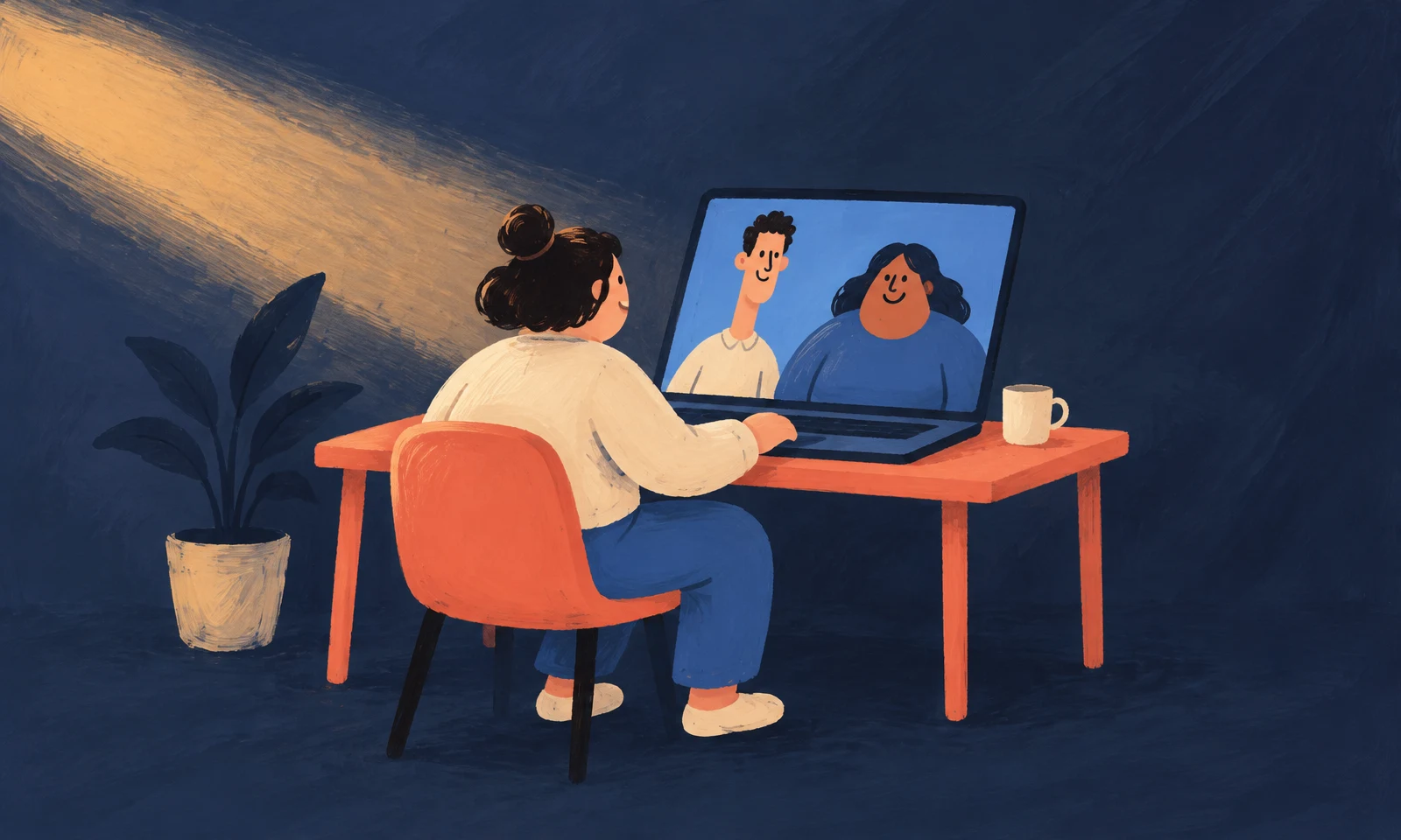 A seated worker in a cream top and blue trousers faces an open laptop at a coral desk, with two smiling teammates on its blue screen.