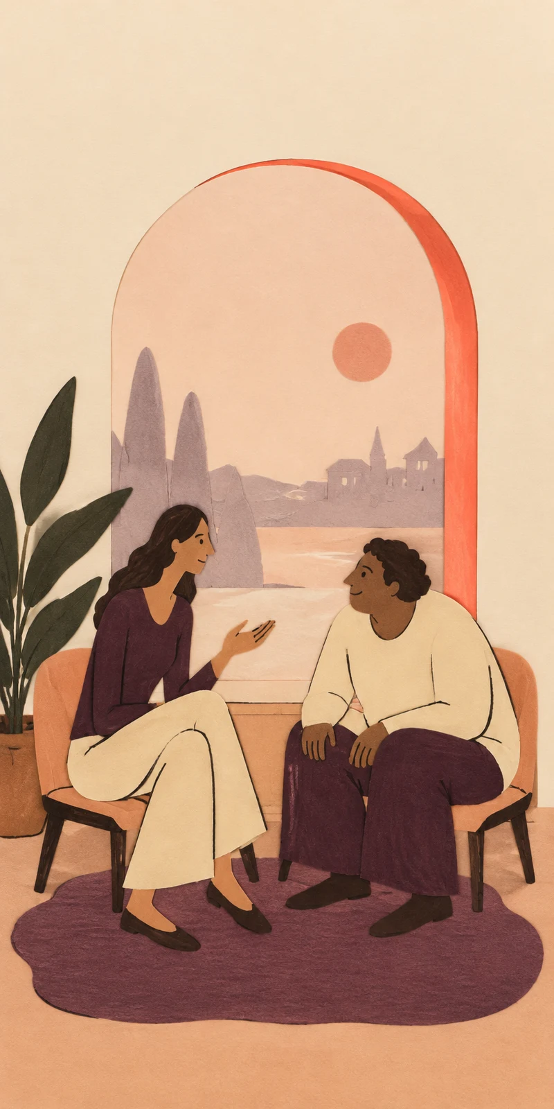 Two adults sit facing each other on peach upholstered chairs, the woman gesturing as the other leans forward with hands on their knees.