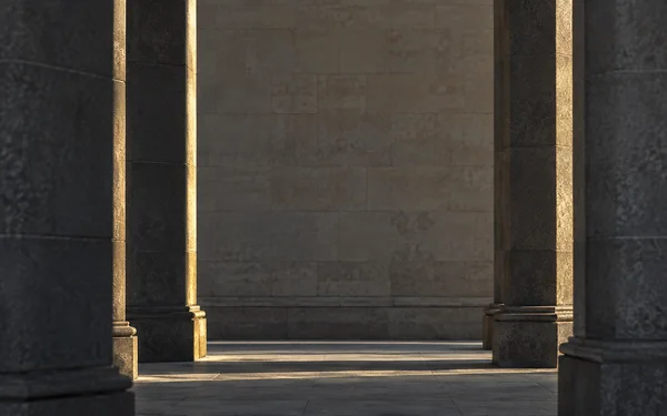 A shaded stone colonnade frames a warm-gray block wall, with low sunlight catching narrow gold edges on the piers and casting bands of light across the stone…