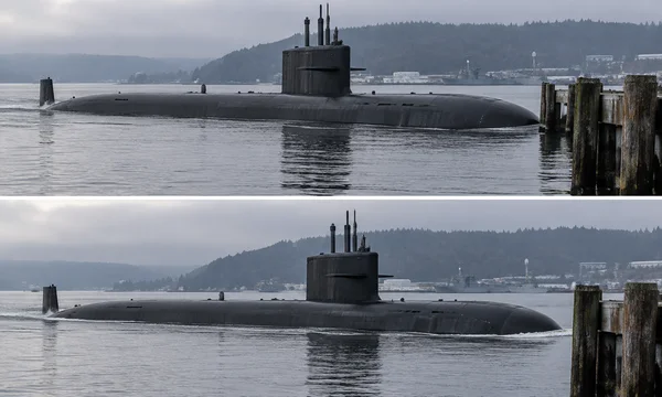 Two stacked views show a surfaced dark submarine moving rightward through a harbor, with wet timber pilings in the foreground and wooded hills across the water.
